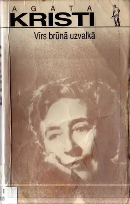 Vīrs brūnā uzvalkā